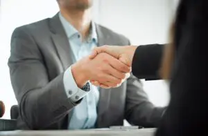 lawyer and client shaking hands