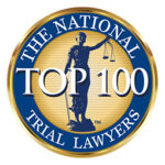 Seal of “The National Trial Lawyers Top 100” featuring Lady Justice holding scales within a circular emblem.